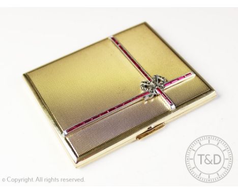 An Art Deco style gold plated powder compact, the rectangular case and hinged cover with paste set ribbons and a marcasite bo