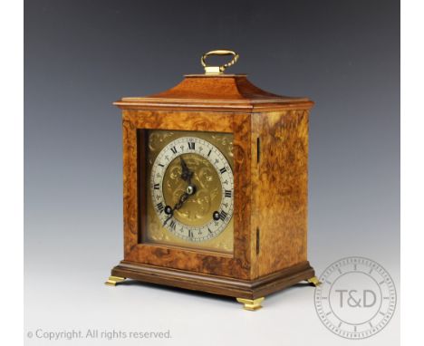 A Goldsmiths & Silversmiths Co Ltd walnut eight day mantel clock, the square case with pagoda top enclosing a Roman numeral c