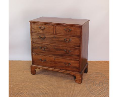 A late George III mahogany chest, with two short and three graduated long drawers, on bracket feet, 100cm H x 95cm W x 50cm D