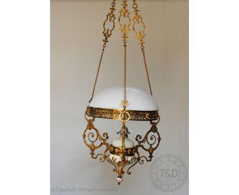 A late 19th century continental gilt brass oil ceiling light, with Zsolnay Pecs ceramic reservoir holder and drop, opaque gla