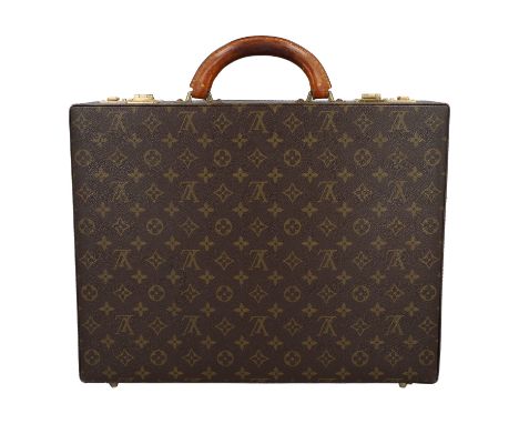 LOUIS VUITTON VINTAGE Aktenkoffer "PRESIDENT". Monogram Canvas Serie mit goldfarbener Hardware. Doppeltes Zahlenschloss (Code