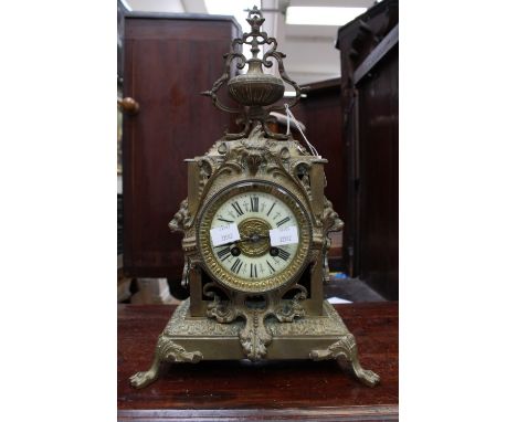 A gilded brass late Victorian mantel clock 