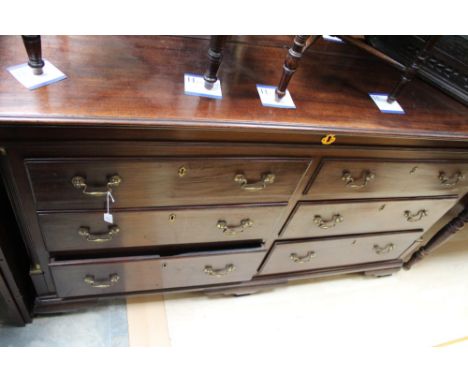 A George III mahogany Lancashire mule chest, with two dummy drawers and four drawers, raised on bracket feet 