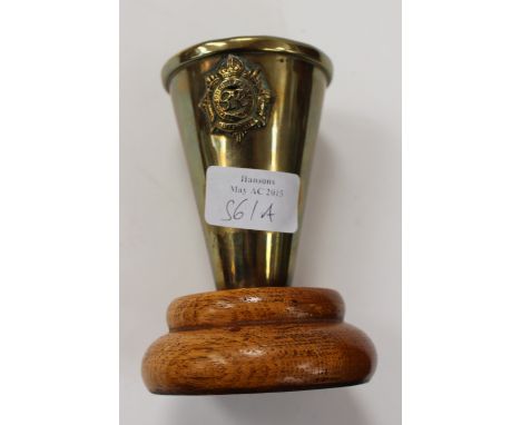 Trench Art, a brass beaker mounted on oak with Royal Army Service Corps badge, mounted 