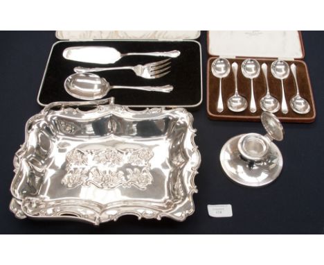 A silver capstan inkwell, Walker and Hall 1938, a plated cake stand and two sets of boxed plated spoons, etc 