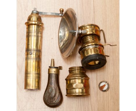 A miners brass helmet lamp, a brass grinder, a copper and brass gunpowder flask, etc (5) 