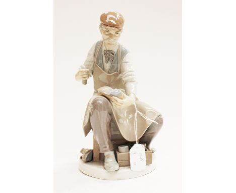 A Lladro figure of a Cobbler (hammer missing) 
