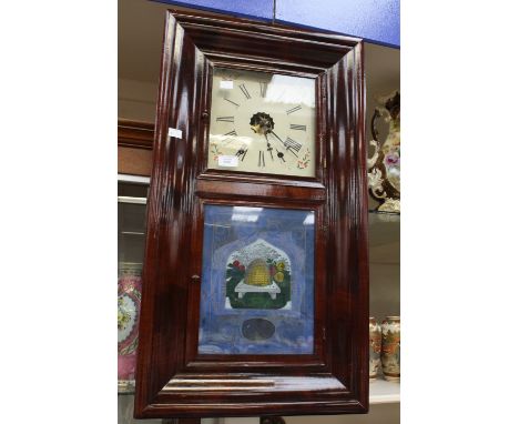 An American Jerome & Co, New Haven, wall clock, printed glass behive panel