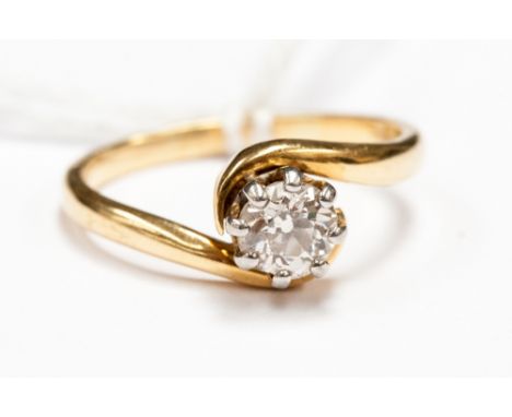 A solitaire diamond ring, claw set old cut diamond 