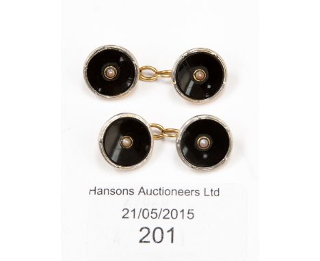 A pair of 18 carat gold, pearl and enamel/onyx cufflinks