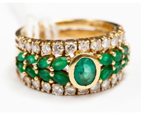An 18ct gold, emerald and diamond ring, approx 0.81 ct diamonds 