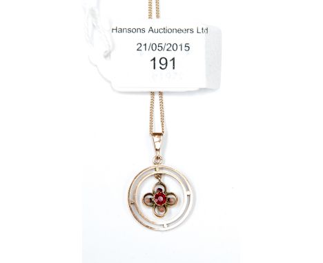 A 15ct pearl and ruby pendant (has been restored) with 15ct chain 