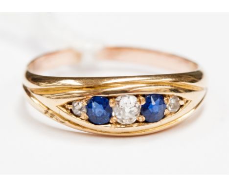 A sapphire and diamond 18ct gold ring 