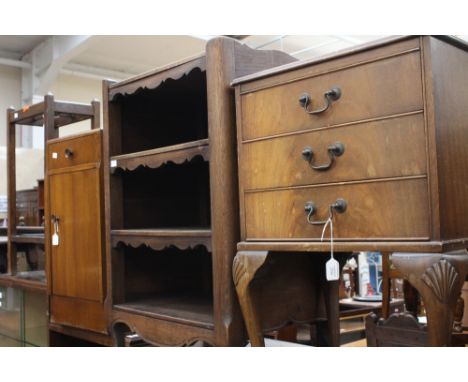 A Queen Anne style mahogany three drawer bedside cabinet, together with a three tier shelving unit, a 1930's bedside cabinet,