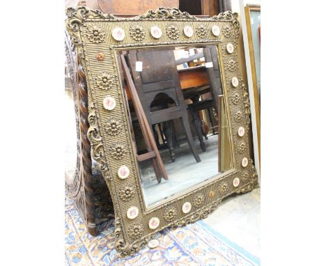 A square beveled edge mirror, set in approx 10cm deep gilded frame, with 16 LIMOGE ceramic disks decorating the frame