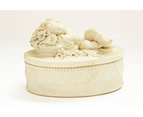 A Parian oval trinket pot, with reclining cherub to the cover 