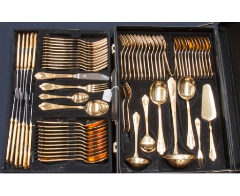 A German Solingen cased 12 place canteen of cutlery, in 24 carat gold plate, comprising dessert spoons, tea spoons, dinner kn