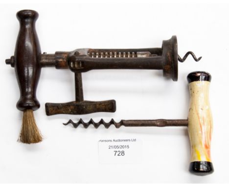A late 19th Century mechanical corkscrew with original brush to handle; together with another corkscrew 
