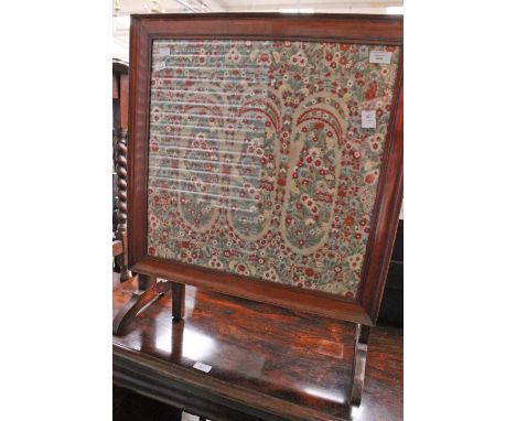 An early 20th Century floral embroidered folding fire screen table.