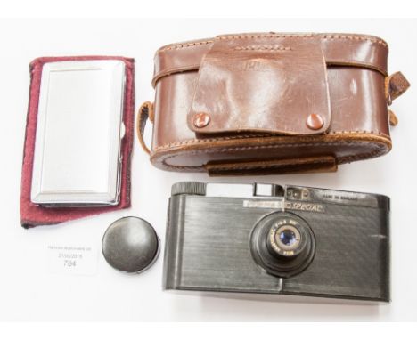 A Vulcanite Purma special (English) camera in stitched leather case and a chrome cigarette and lighter case (2) 