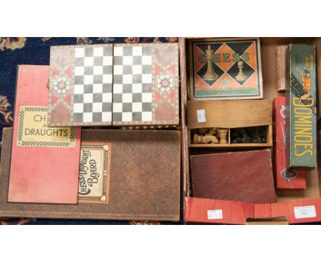 A box of inlaid chess men boxes, vintage card and board games 