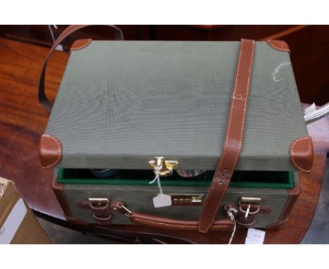 A baize lined shotgun cartridge case of suitcase form, to hold 250 cartridge; together with a modern table light holder 