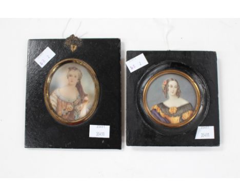 A portrait miniature, circular outline, half length, on ivory, in square ebonised frame; together with companion French oval 