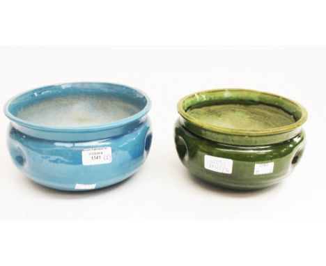 A Bretby circular planter glazed in tones of green, 19 cm diameter approx; together with a blue circular bowl, 22 cm diameter
