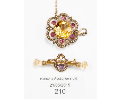 A Victorian/Edwardian pierced pendant/brooch set hexagonal citrine, rubies and border of pearls and a brooch set heart shape 