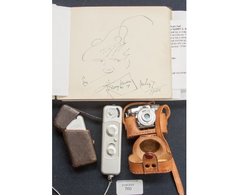 A Minox cased spy camera, with cased flash attachment, and a mycro miniature camera (mycro IIIA) and an autograph album, dati