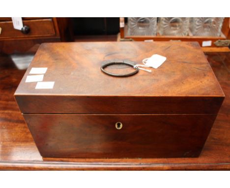 A George III mahogany rectangular tea caddy, handle to lid, ivory escutcheon, divided interior 