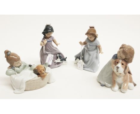 Nao figurines, four studies of young girls with dogs (boxed) 