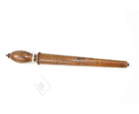 An Edwardian treen ring sizer 