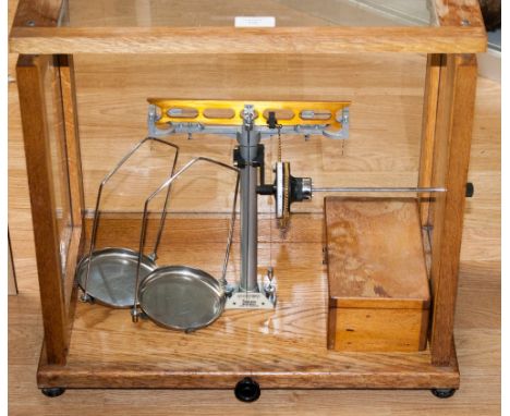 A Towers Widnes cased balance scales, including boxed weights 