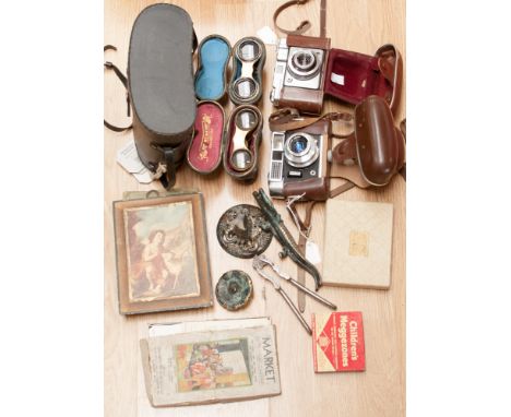 Two 1960s leather cased cameras, two pairs of cased field binoculars, a further case of binoculars and a collection of assort