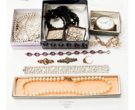 A sterling silver bead necklace and bracelet, a pocket watch, sapphire ring, two brooches and a quantity of costume jewellery