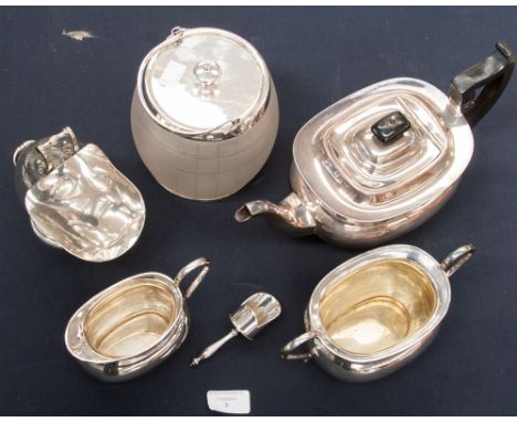 A silver plated boat shape teapot, sucrier and jug, sugar and glass biscuit barrel 