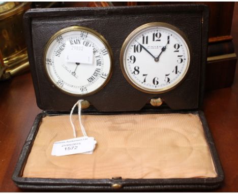 An early 20th Century travelling clock set, comprising pocket watch and barometer, both with white enamelled dials, both stam