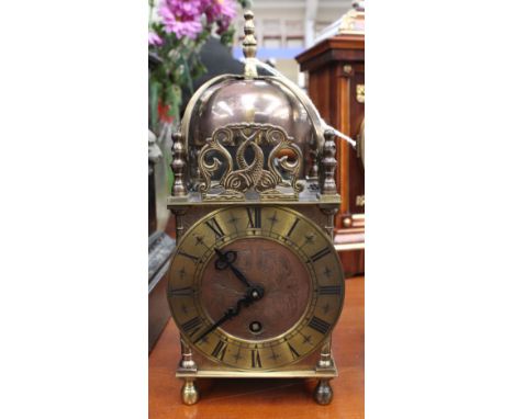 A Smiths brass mantle clock in the 17th Century style, 25 cm high approx 