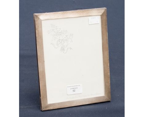 A silver picture frame, engine turned, Birmingham Aide Bros hallmark, measuring approx 17.5 by 22.5 cm 