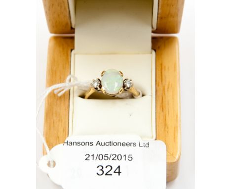 A 9ct opal and diamond ring 