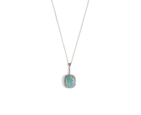 A chain and pendantGold and silver pendantSet with black opal and 37 antique brilliant cut diamonds totalling approximately 0