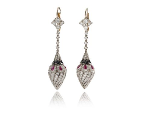 A pair of earringsGold 585/000 and platinum 850/000Black enamel decorationSet with 12 drop cut rubies totalling approximately