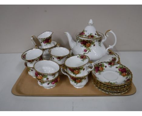 A tray containing a twenty seven piece Royal Albert Country Roses tea service  
