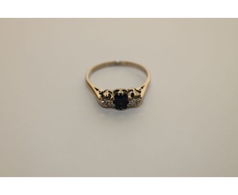 An 18ct gold sapphire and diamond ring