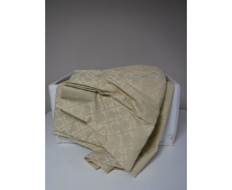 Two Ikea lidded storage Ottomans containing curtains