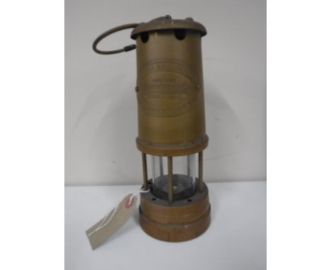 A miner's lamp for The British Coal Mining Company, Wales, U.K., Aberman Colliery, serial number 40219, height 23 cm. 