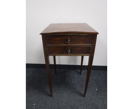 A Victorian inlaid mahogany side table fitted two drawers