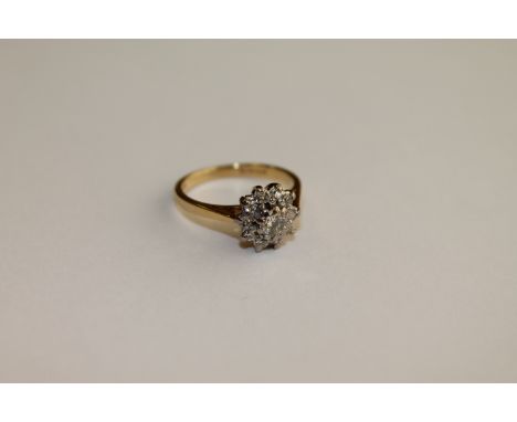 An 18ct gold diamond cluster ring