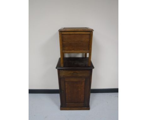 An oak cabinet and a commode stool 